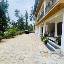 CT HOMESTAY, Omassery