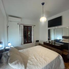 Casa Céntrica de 2 Habitaciones con Patio y Parrilla