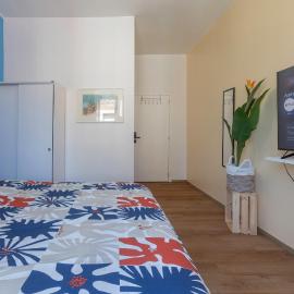 Chambre climatisée RIO Sale de bain privée check in autonome cuisine partagée