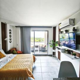 Modern suite steps from the sea