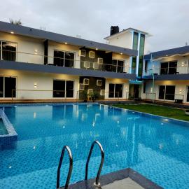 Prasanna Beach Resort, hotel en Alibaug