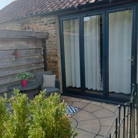 Larch Cottage Ruston with hot tub, dogs go free