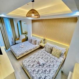 1 Bedroom NAMI Suite Japandi-Inspired by THE BALI CORNER AT AZURE NORTH, CORNER UNIT with BIG Balcony and Amazing FULL view of the Beach Resort Amenities, hotel San Fernandóban