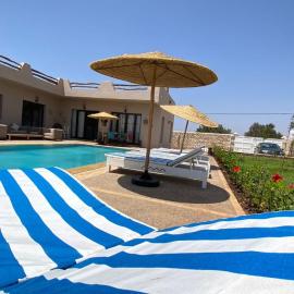 Villa El raha, hotel in Oulad Akkou