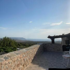 Πετροχτιστο Ρηνιω, hotel in Kafióna