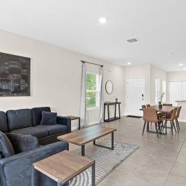 Large 3BR Townhome| Pool | Gym | Close to Beach.
