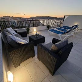 Bright Coastal Penthouse with Huge Terrace Overlooking the Sea- Ghadira Mellieha