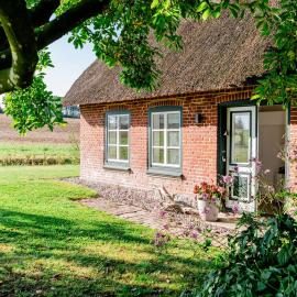 Ferienwohnung Teve - hyggelig & ebenerdig mit Kamin und großem Außenbereich