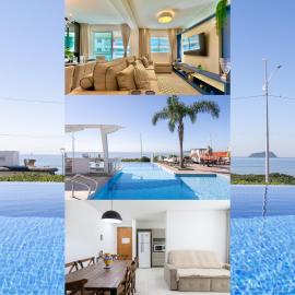 Apto Vista Mar Home Club Pé na Areia 3 Quartos Ares Condicionados Cozinha Completa Piscina Aquecida Jacuzzi Sauna Academia Quadra Playground Salão de Jogos 15min do Beto Carrero, hotel a Piçarras