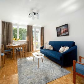 Blue Two Bedroom Apartment in Wrocław with Desk, Bathtub and Balcony by Noclegi Renters