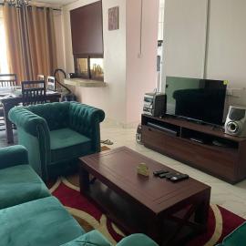 Furnished 2BR Apt with Wi-Fi, AC, gym, pool in Kampala, hotel a Kira
