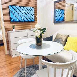 Modern Cozy 2-Bedroom Smart Lock Condo with Netflix 4K at Seawind Davao