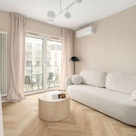 Beige Apartment in Poznań with Parking and Air Conditioned Living Room by Noclegi Renters