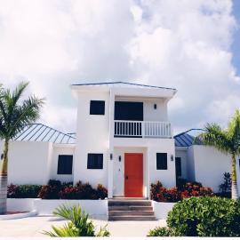 Stay in a Long Bay Beach Villa with a Shared Pool