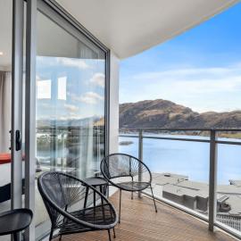 Sunlit Serenity Lakefront Apartment