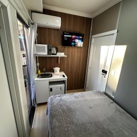 Loft Lux SM Chapecó | Conforto e Praticidade com Ar, Cozinha e Smart TV