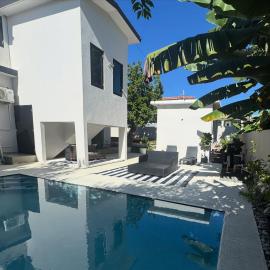 The Hibiscus House - King Suite, Terrace, and Pool