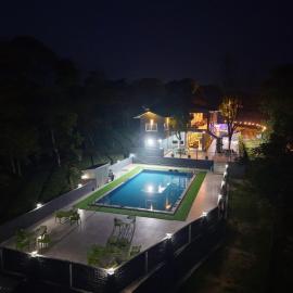 Mansimble Tea Estate Lodge & Camp, hotel din Bawarna