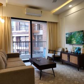 The Tranquil Haven - Candolim 1BHK with Pool & Balcony