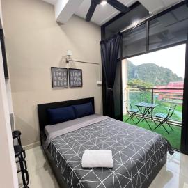 GR studio APARTMENT 1 - kompleks MUTIARA gua MUSANG, отель в городе Гуа-Мусанг