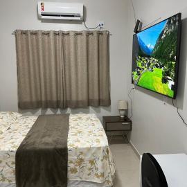 Casa com suite bem localizada