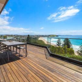 Morning Glow - Wake up to breathtaking views and golden sunrises at this serene coastal retreat.