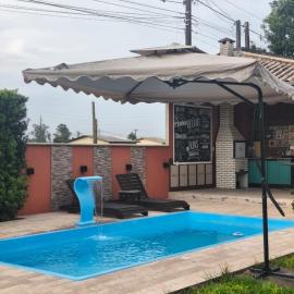 Sombrio, Balneário Gaivota , casa com piscina, Hotel in Sombrio