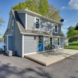 Family Friendly! Lakefront Tully Getaway w/ Porch, hotel in Tully