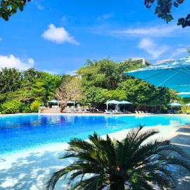 TDJ Japandi Room with Residential Pool access in Tambuli Seaside Mactan, hotel a Maribago