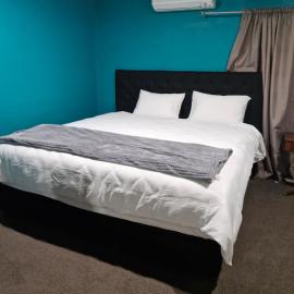 Master bedroom, hotel in Tauranga