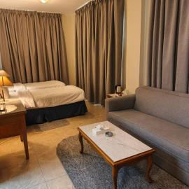 Kindi Suite Hotel, отель в Аммане