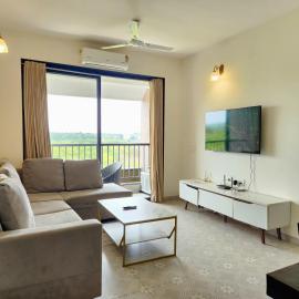 Dreamy Candolim Esacpe - 2BHK with River View & Pool - Premium Stay Experience