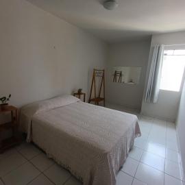 Quarto com banheiro privativo perto da praia
