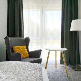 Pension Belger Serviced Apartments Zimmer und Wohnungen
