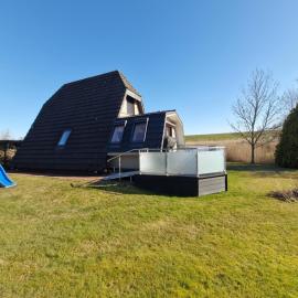 Nurdachhaus in Burhave, hotel en Burhave