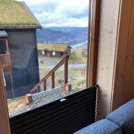 Ski-in & ski-out apartment in Hafjell, hotel v destinácii Øyer
