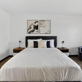 Bright modern studio featuring full kitchenette