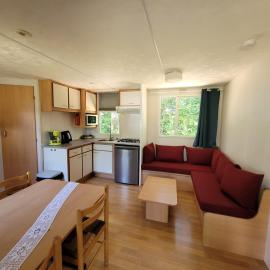 Stacaravan 6 persoons - Camping Le Soustran, Hotel in Neuvic