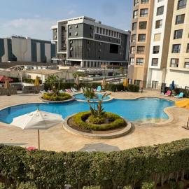 elegant one bedroom hotel appartment Porto New Cairo pool access