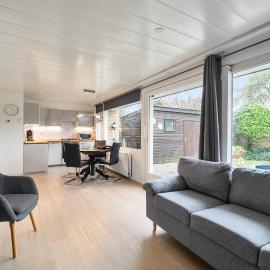 Bungalow mit Sonnenterrasse und großem Südgarten in Strandnähe - Garnekuul 69, hotel in Callantsoog