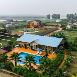 Aurea 4-BHK Farmhouse by ELIVAAS with Private Pool, Garden & Gazebo