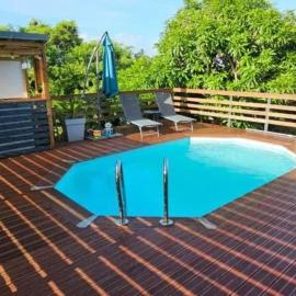 Appartement lumineux avec piscine à Le Moule, 70 m²