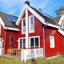 Ferienhaus Wellenbrecher Sauna - Whirlpool - Kamin - Wlan - Wii - bis 6 Personen, hotel in Glowe