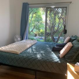 Fabulous Stunning Garden View King Bedroom with shared bathroom at MC 2079