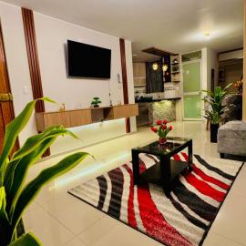 moderno departamento en estreno con cochera, hótel í Tacna