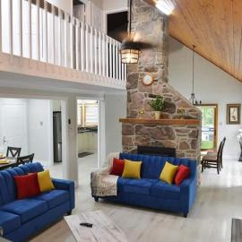 Modern 4BR Lake Escape with Patio & BBQ Area