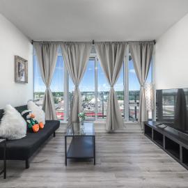 UC Stampede Condo by Train, Hospital, free UG parking & Gym, AC, full kitchen, hotel en Calgary