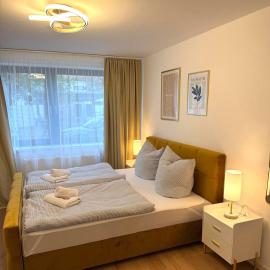 Moderne, komplett eingerichtete Wohnung mit Parkplatz & 24h Check-in