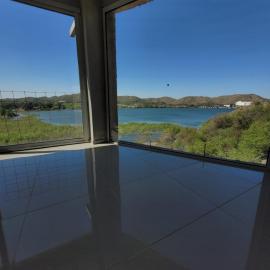 Punta El Tesoro - Playa Privada al Lago