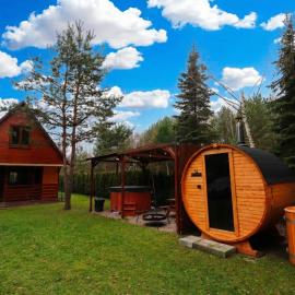 Całoroczny, drewniany domek przy lesie, hotel em Prażmów